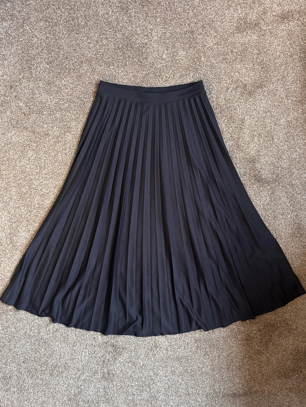 Black pleated midi skirt